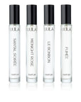 UULA Travel Collection fragrance set with four 10 ml bottles neatly presented. The bottles represent a perfume passport, offering scents for different occasions, from exotic sunsets and sophisticated evenings to starlit adventures and joyous moments.