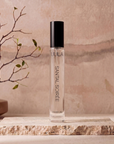 Santal Soirée 10ml parfum styled on travertine