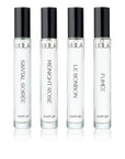 UULA Travel Collection fragrance set with four 10 ml bottles neatly presented. The bottles represent a perfume passport, offering scents for different occasions, from exotic sunsets and sophisticated evenings to starlit adventures and joyous moments.